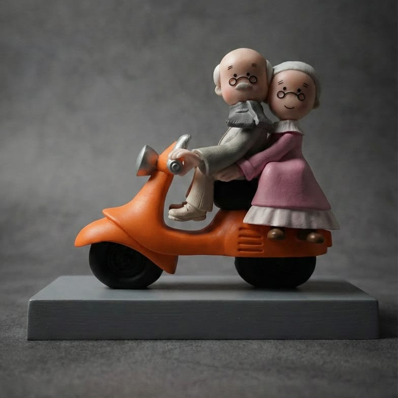 Aged Scooter Couple Miniature