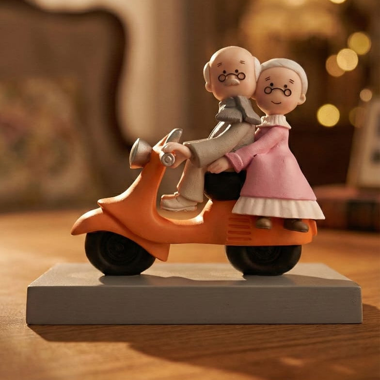 Aged Scooter Couple Miniature