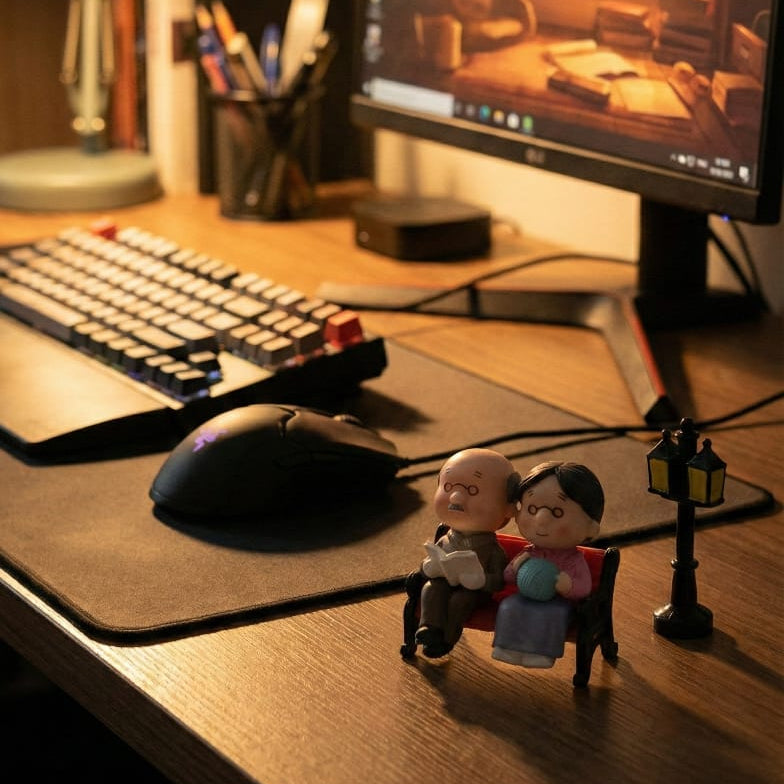 Aged Sitting Couple Miniature